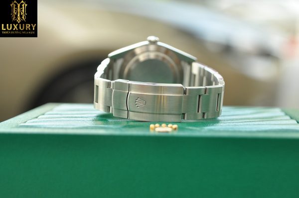 Đồng hồ Rolex Oyster Perpetual Steel 114300 mặt xanh - HT Luxury