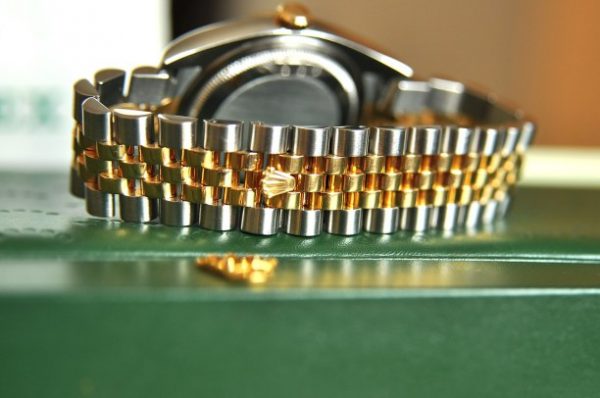 Đồng hồ Rolex 116233 mặt vi tính demi vàng 18k cọc kim cương